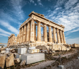 Parthenon on the Acropolis of Athens, Greece. Ancient Greek Parthenon is a top landmark of Athens. Panorama of ruins of the antique Athens city in summer. Famous old architecture in the Athens center.